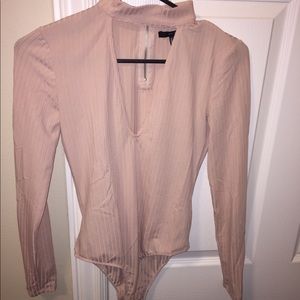 Light pink body suit